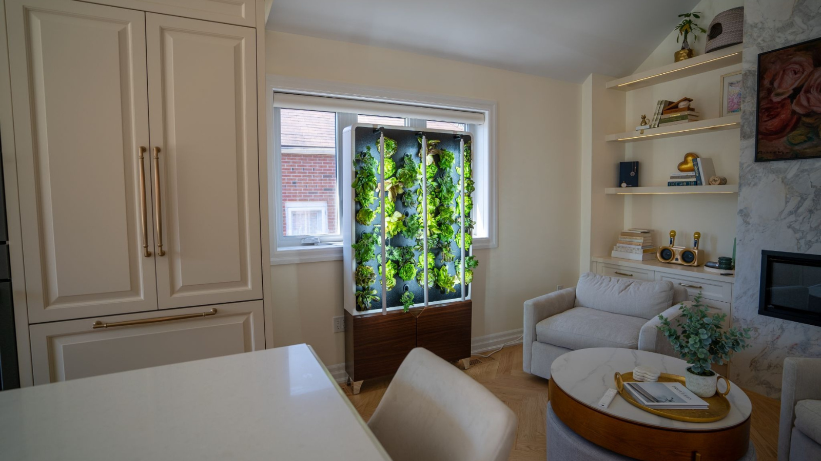 A compact hydroponic grow tower with leafy greens growing in a room corner.