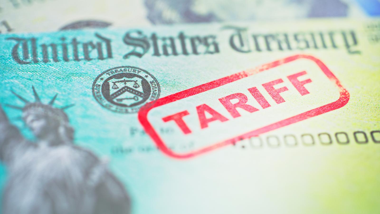 Close-up of a tariff and trade policy document on a desk, symbolizing the regulatory shock affecting cross-border food supply chains